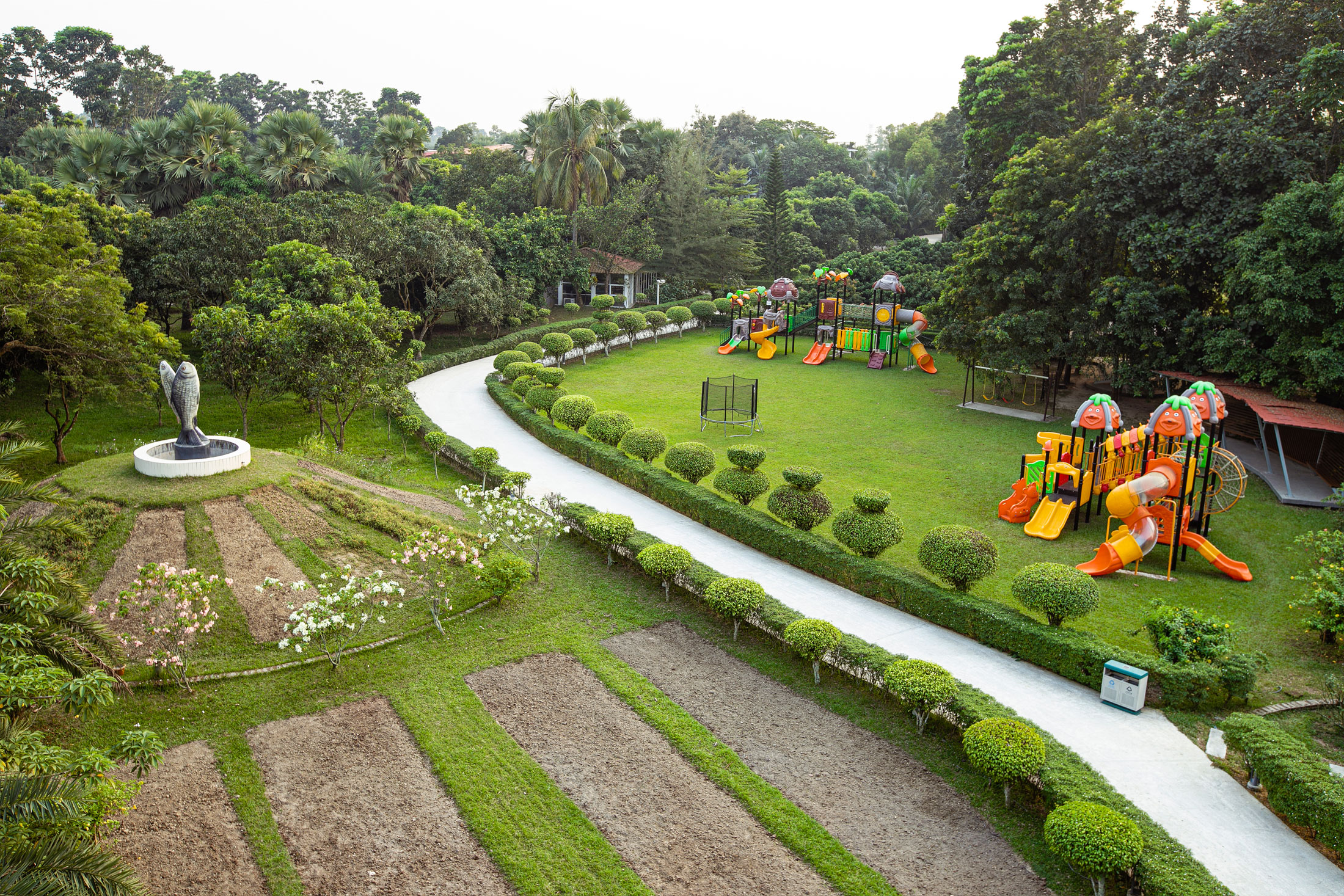 Aerial view across the landscaped grounds and waterways of Dream Square Resort